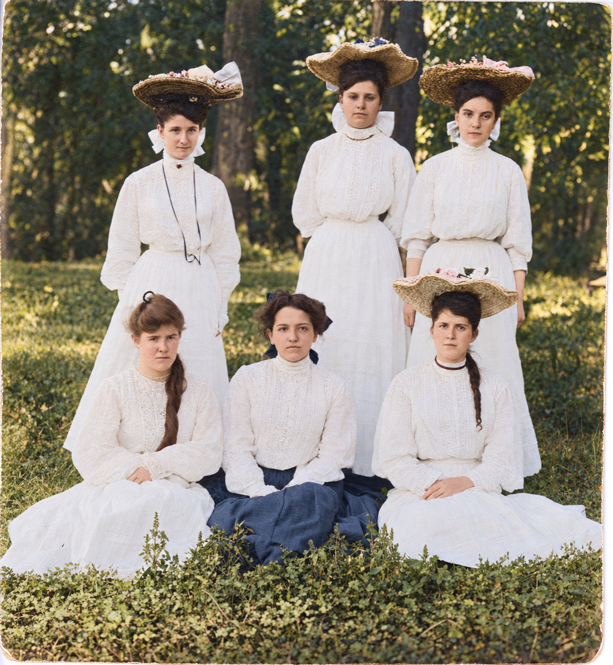 Restored and colorized: Nannie Bowser with five other women, 1905. Nannie is identified in the family catalog as front row, right; the other women remain unidentified. Date and identification are family-supplied.